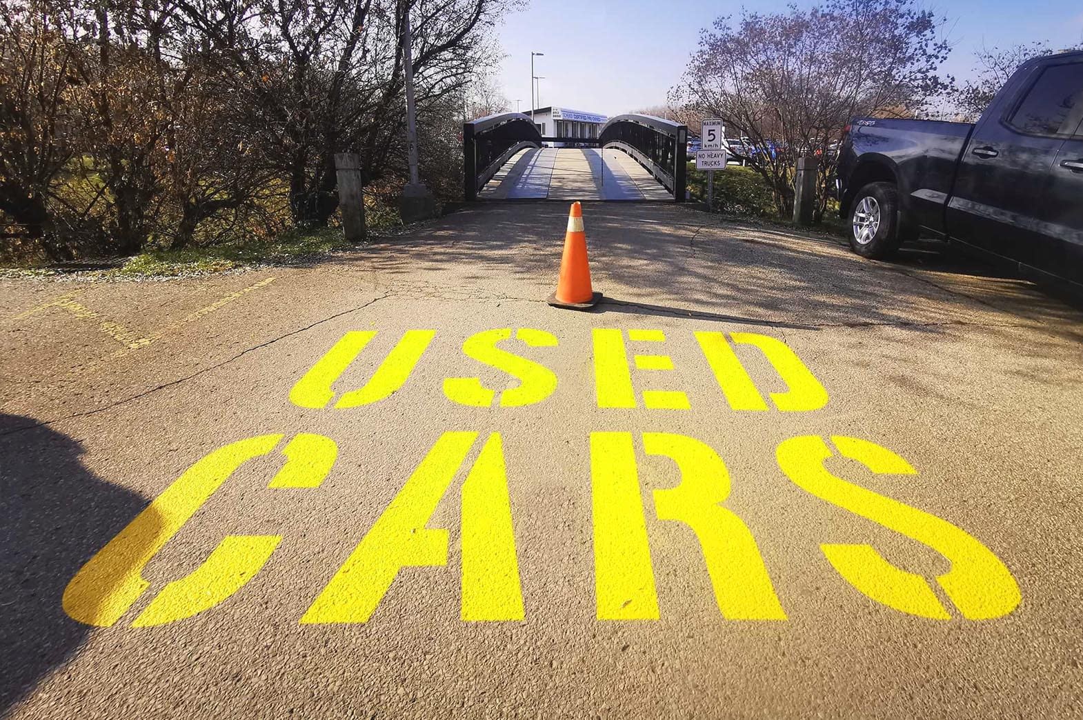 Line painting at a car dealership