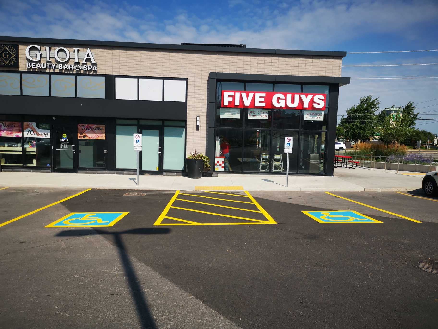 Barrier free line painting in front of a business